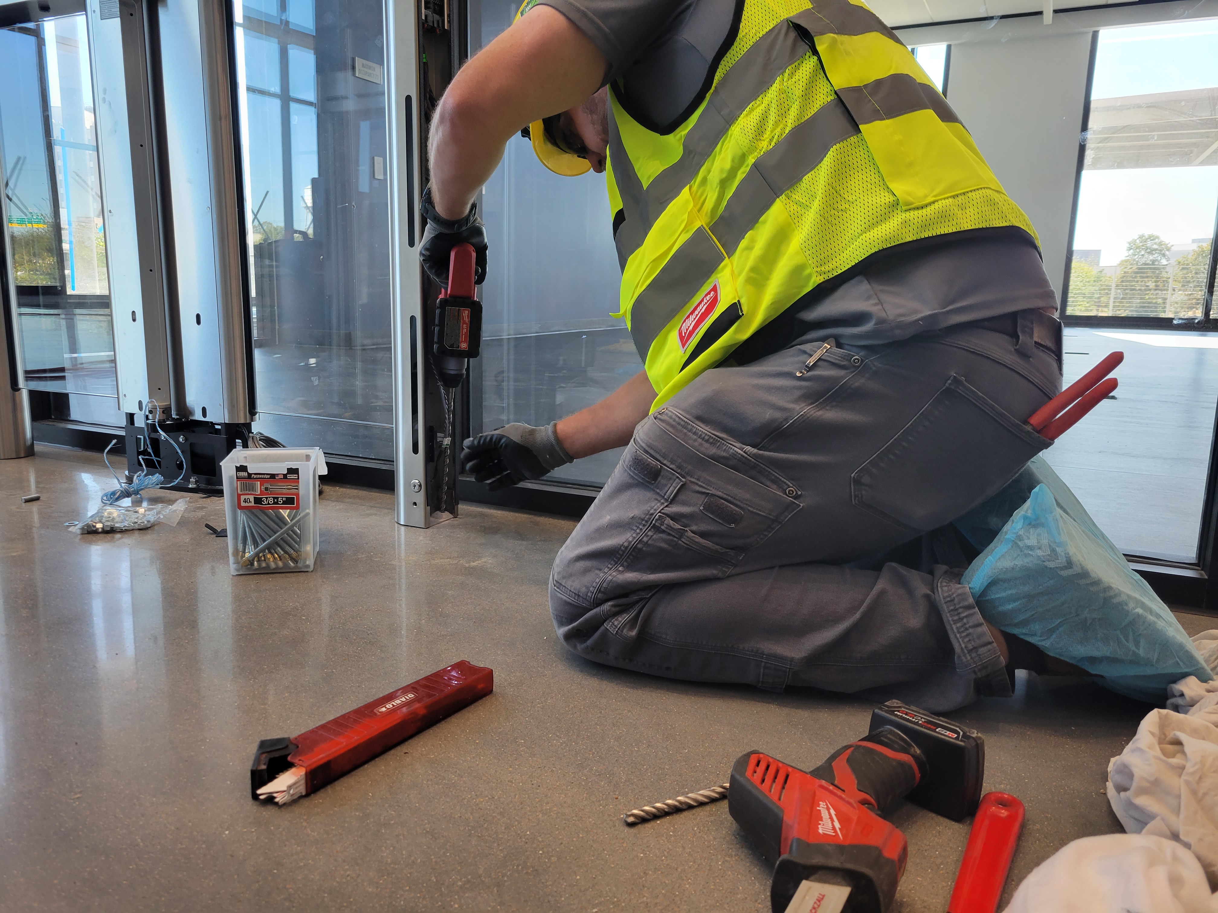 Turnwell technician installing a turnstile